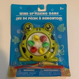 Wind up fishing game